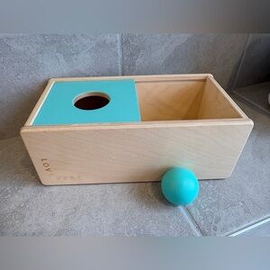 Lovevery Sliding Top Box with matching wooden ball